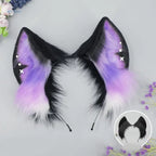 Pair of black and purple fox ears with floral decorations on a light gray background